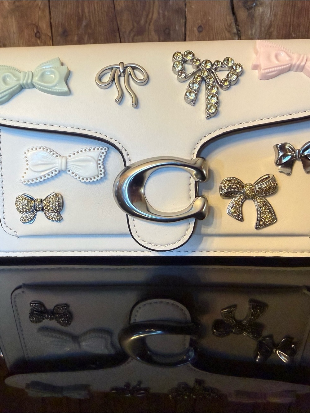 Coach White Shoulder Bag with Bow Accents and Silver Hardware